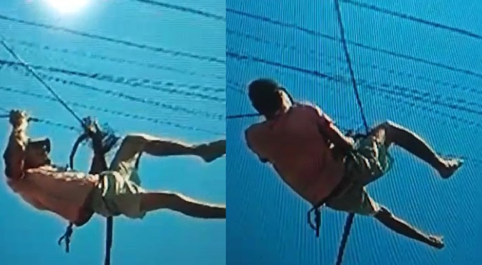 Homem se pendura em poste para furtar fios de internet em Manacapuru; vídeo